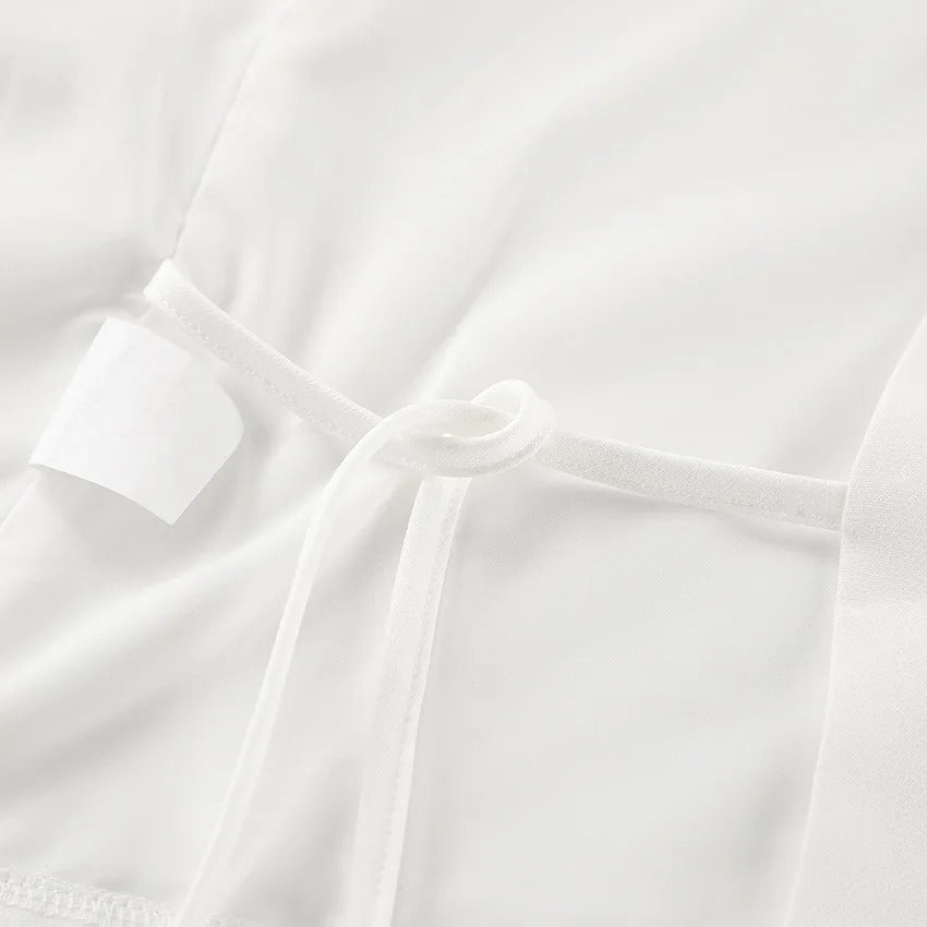 Cross no sleeve vest