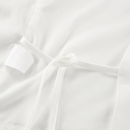 Cross no sleeve vest